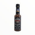 The Kraken’s Fury Honey Rum Naga Chilli Hot Sauce bottle with award badge