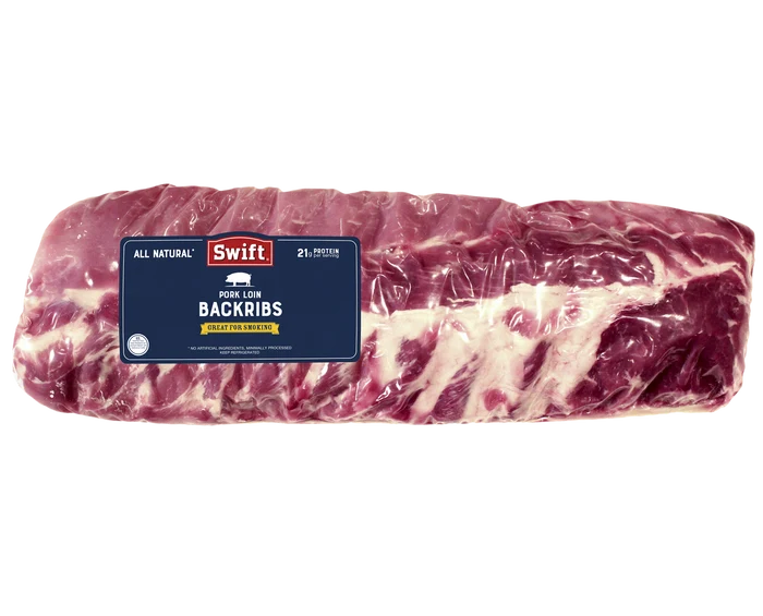 Close-up of pork back ribs with label for BBQ and smoking